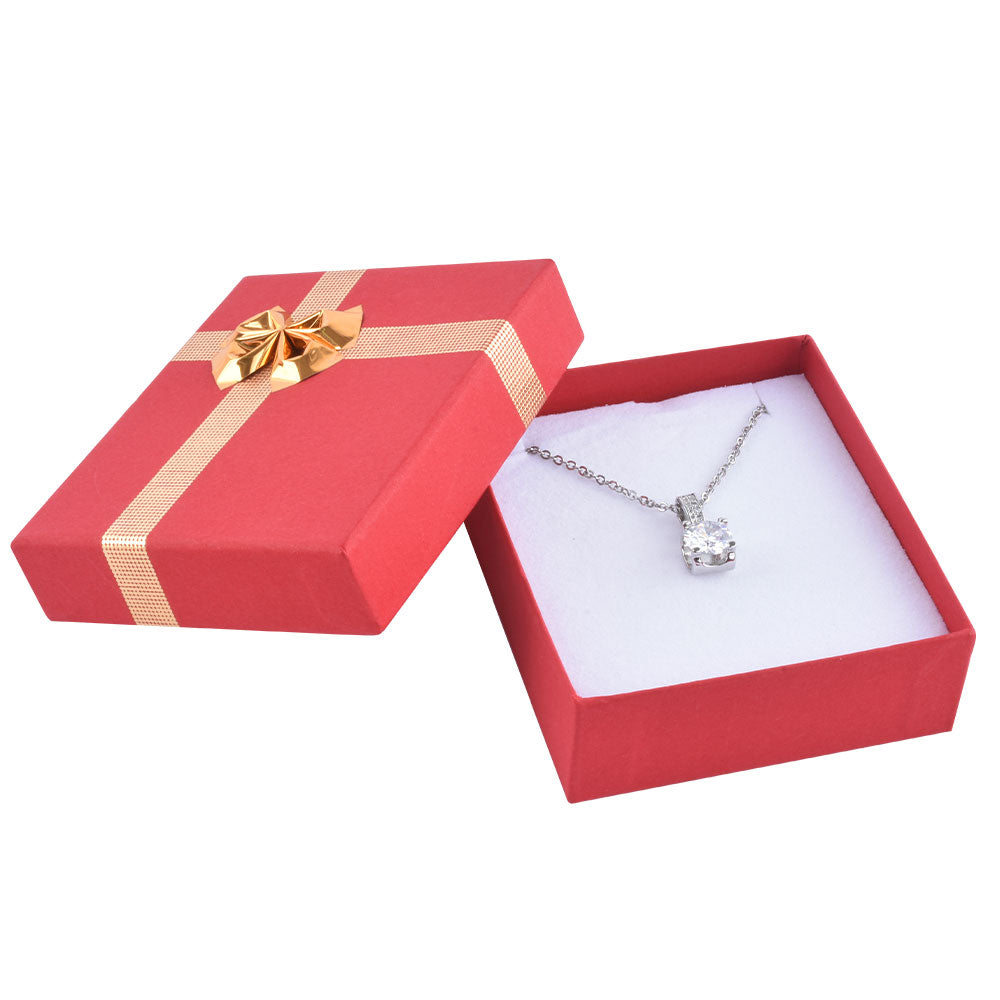 Cajas para pendientes colgantes de color rojo con lazo plateado brillante