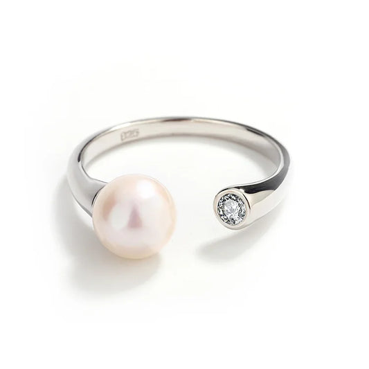 Ladies dainty freshwater pearl sterling silver ring with a white pearl