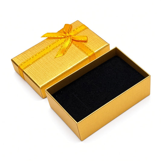 Open gold B2632 bow jewelry gift box with black interior