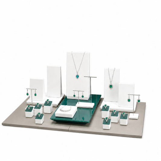 Custom Green Panel Jewelry Display Collection without the backboard, styled with necklaces, earrings, rings and bracelets across the coordinated display pieces