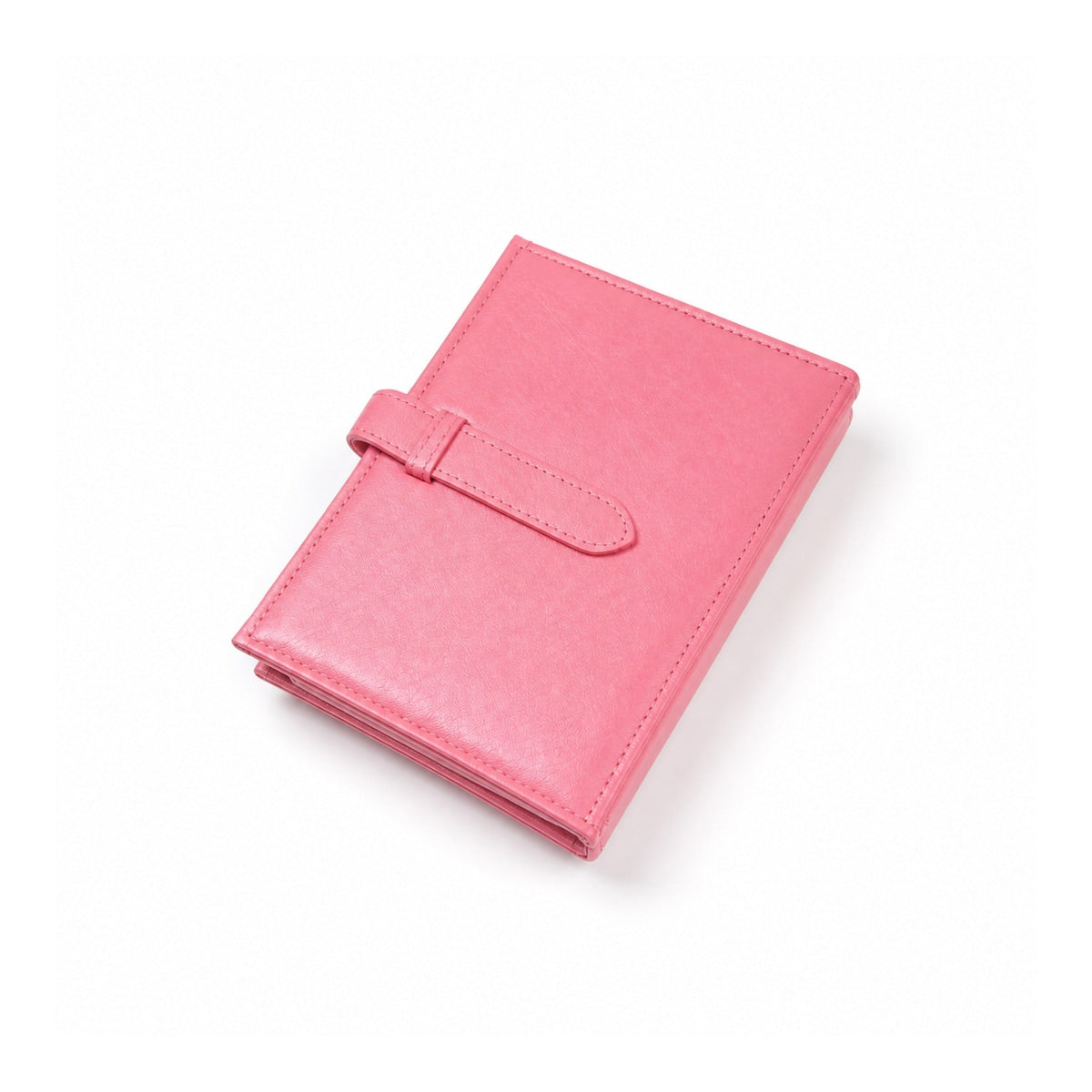 Pink earring storage book, closed with stitched edges and a strap fastening.