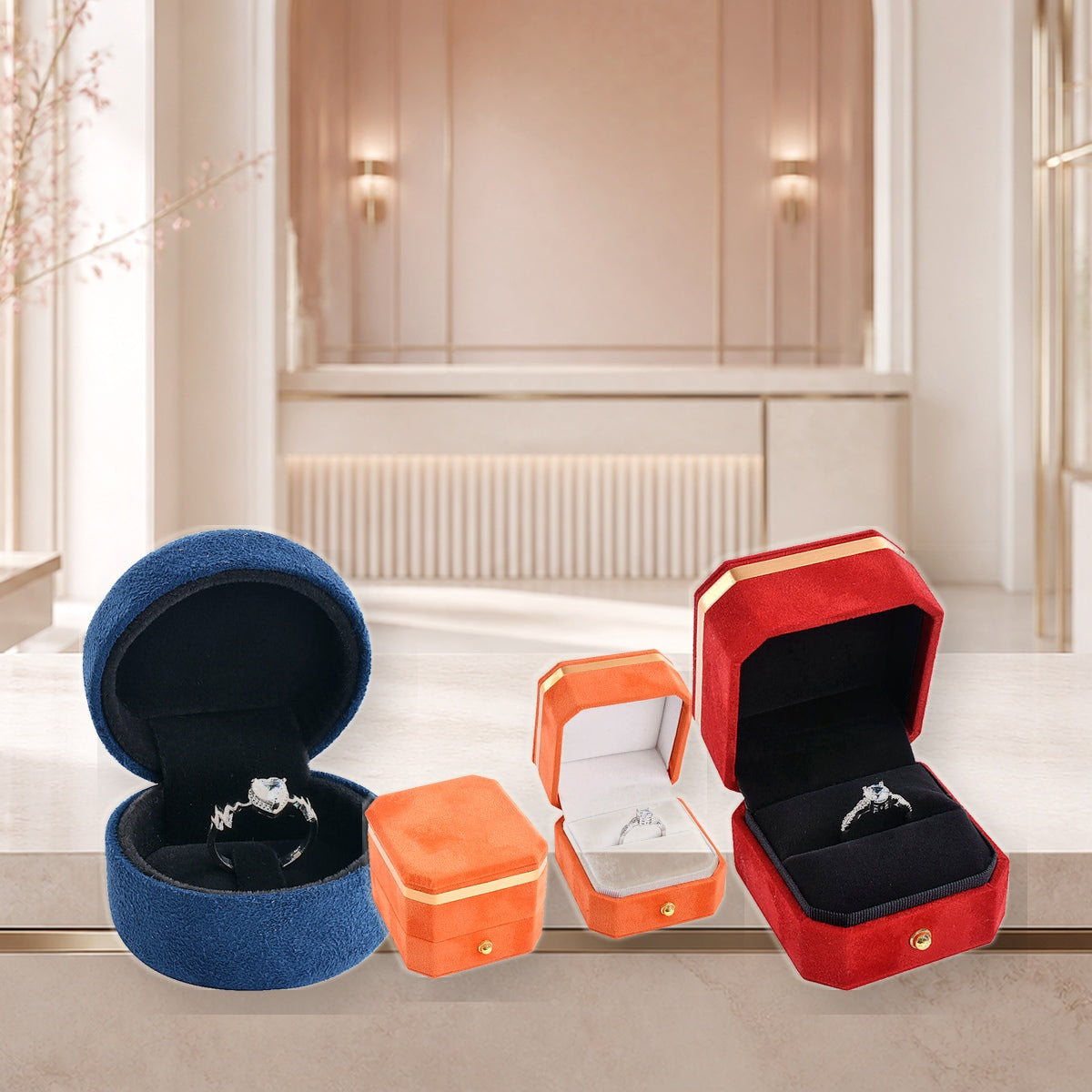 Blue, orange and red jewelry ring boxes with natural textures and gold details