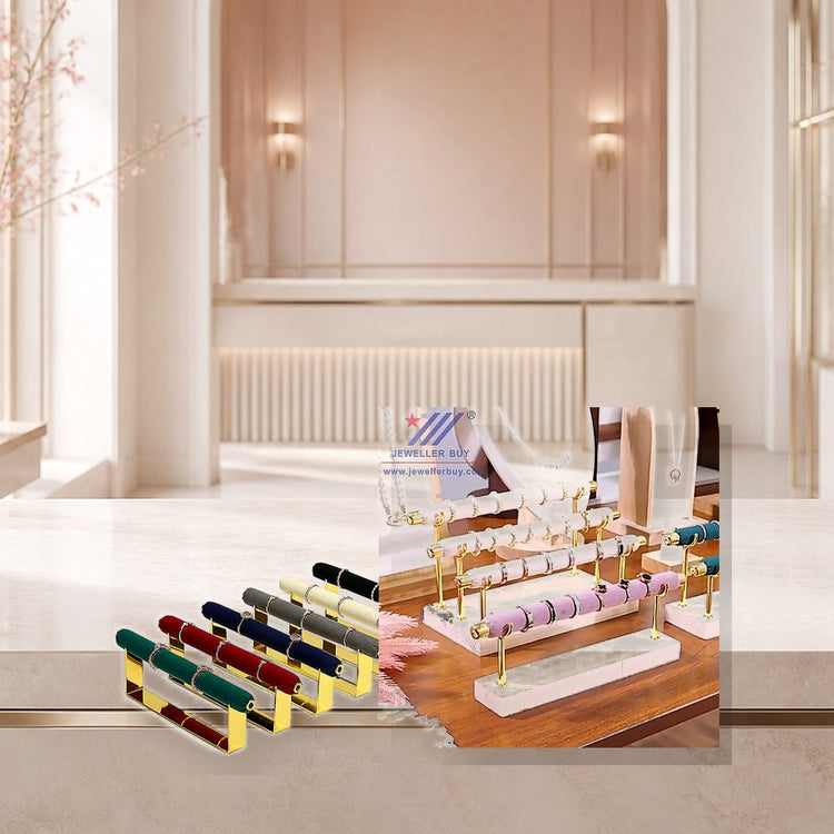 Luxury jewelry display stands with refined materials and bright studio lighting