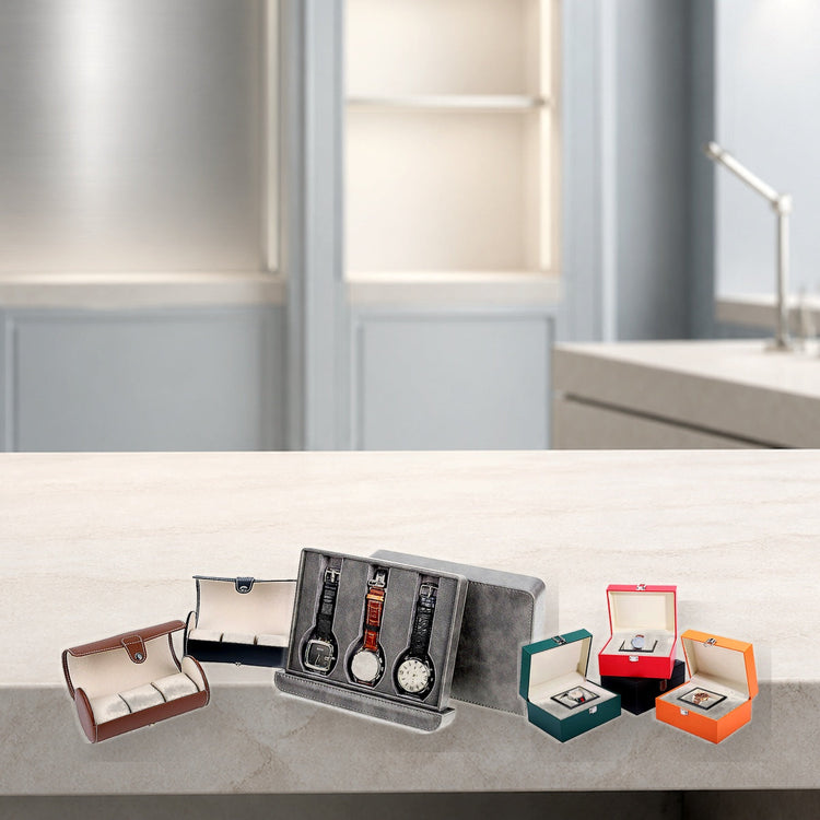 Custom watch boxes with detailed materials on a bright watch atelier counter