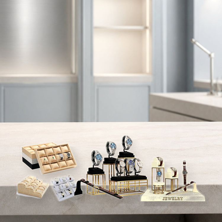 Custom watch display stands with studio lighting in a modern watch atelier