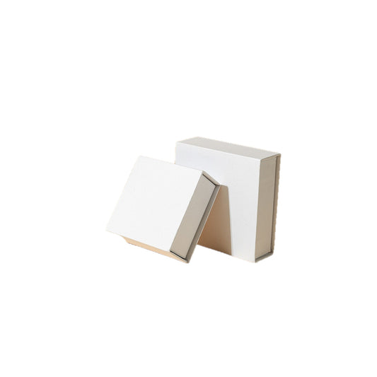 Pearl white magnetic jewelry box on a pure white background