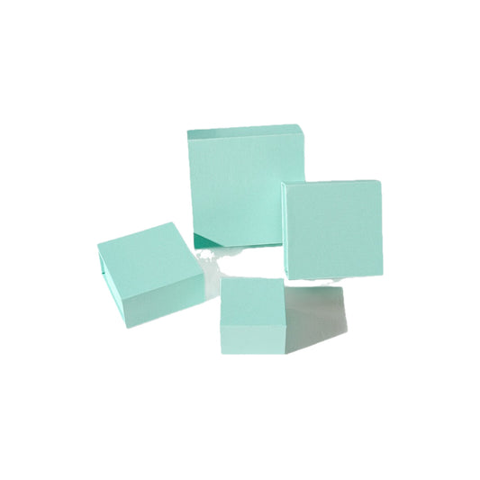 Powder blue magnetic jewelry boxes in multiple sizes on white background