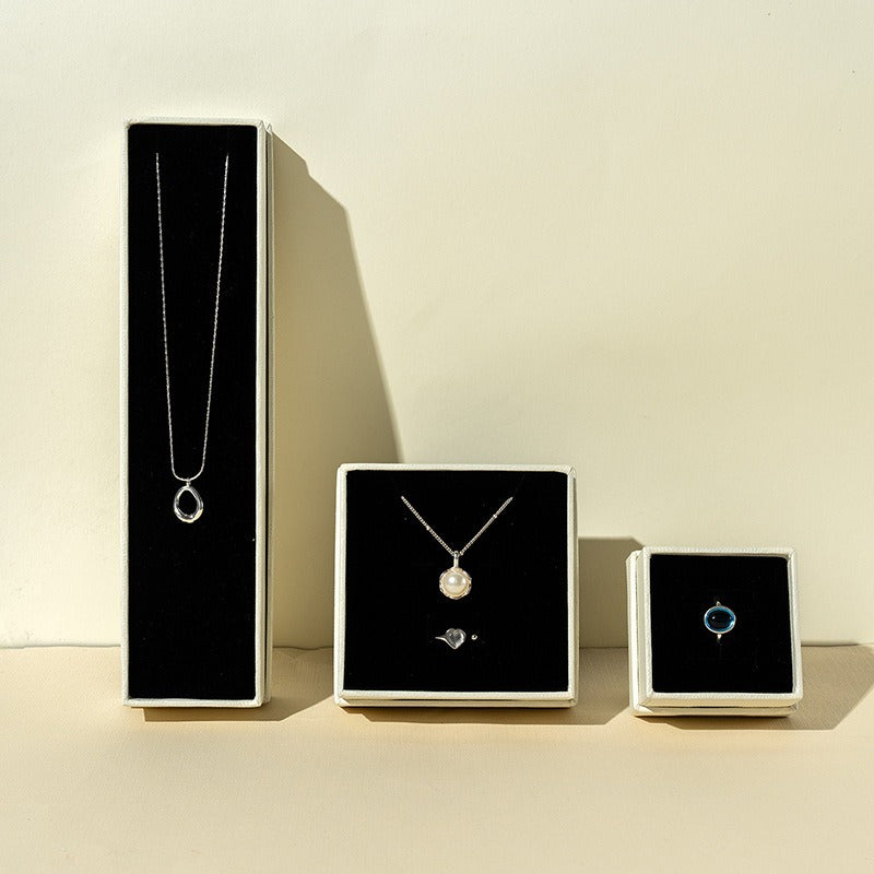 Off-white jewelry packaging boxes for necklace pendant and ring presentation