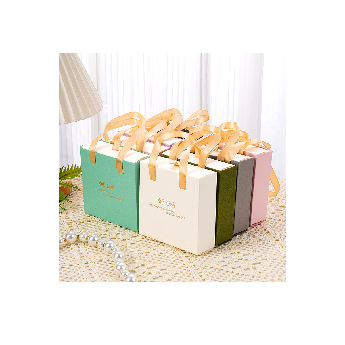 Foldable jewelry packaging boxes with ribbon handles for retail presentation