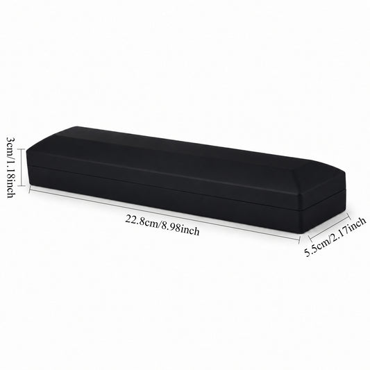 Closed long black bracelet presentation box measuring 22.8 × 5.5 × 3 cm