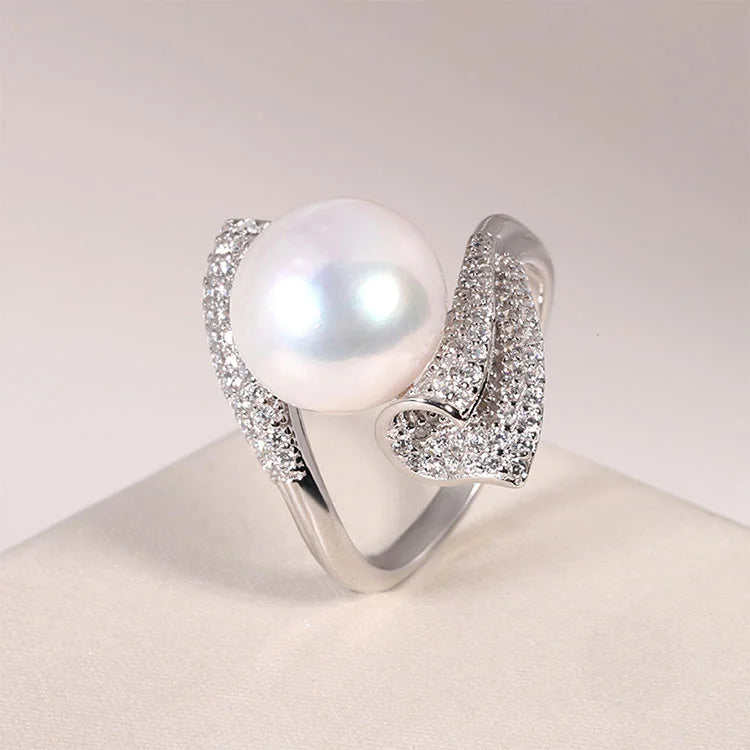 Custom modern one freshwater pearl and cubic zirconia engagement ring with diamonds