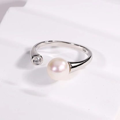 Ladies dainty freshwater pearl sterling silver ring with a white pearl