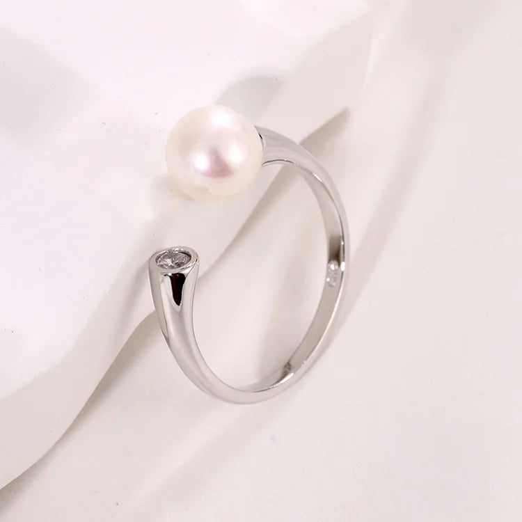 Ladies dainty freshwater pearl sterling silver ring with a white pearl