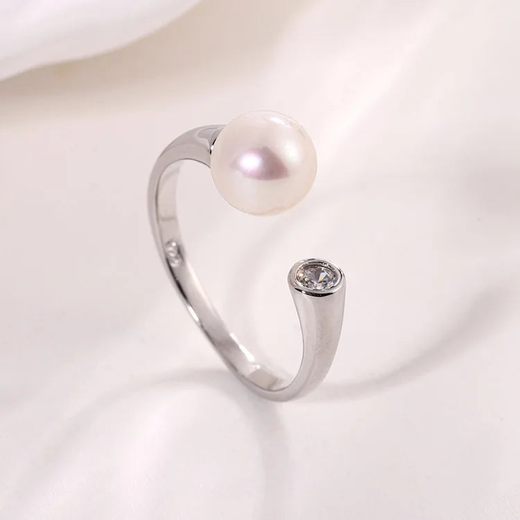 Ladies dainty freshwater pearl sterling silver ring with a white pearl