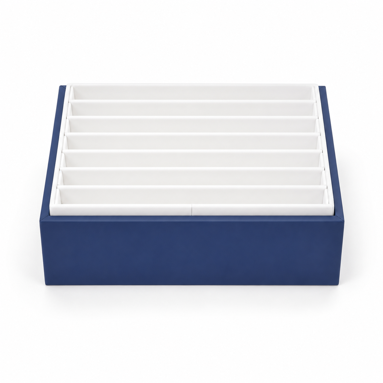 White seven-section bracelet organizer insert inside a deep blue jewelry tray
