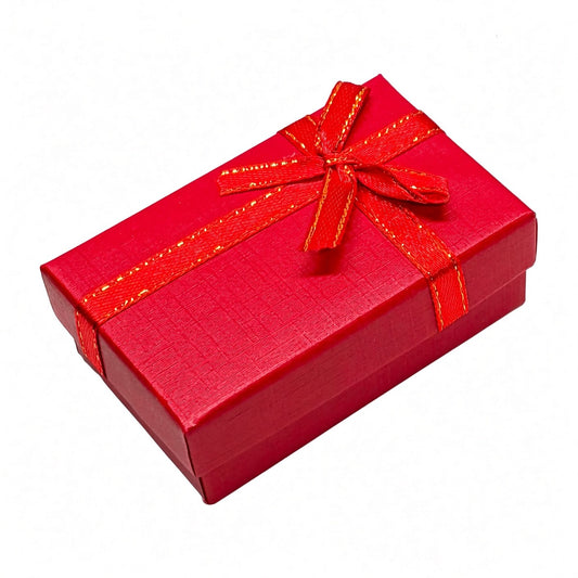 Closed red B2632 bow jewelry gift box on a pure white background