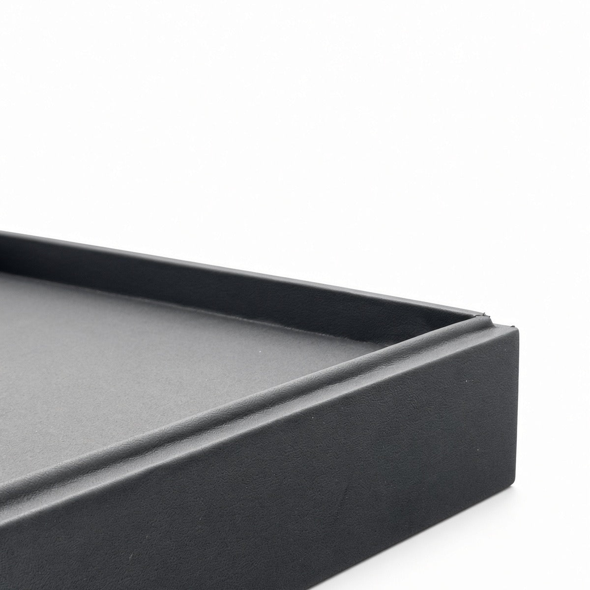 Black 56-slot ring display tray corner detail