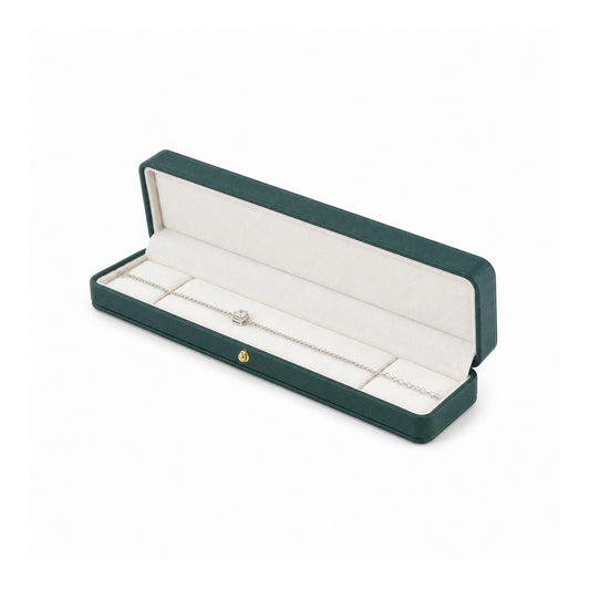 jade green PU bracelet box open in a three-quarter view with a bracelet.