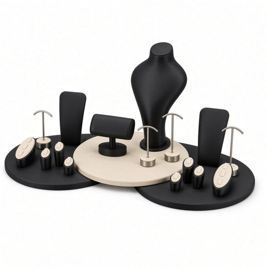Custom Black Circular Platform Jewelry Display Rack Set shown without the backboard in a black and cream arrangement with the display pieces presented for configuration review