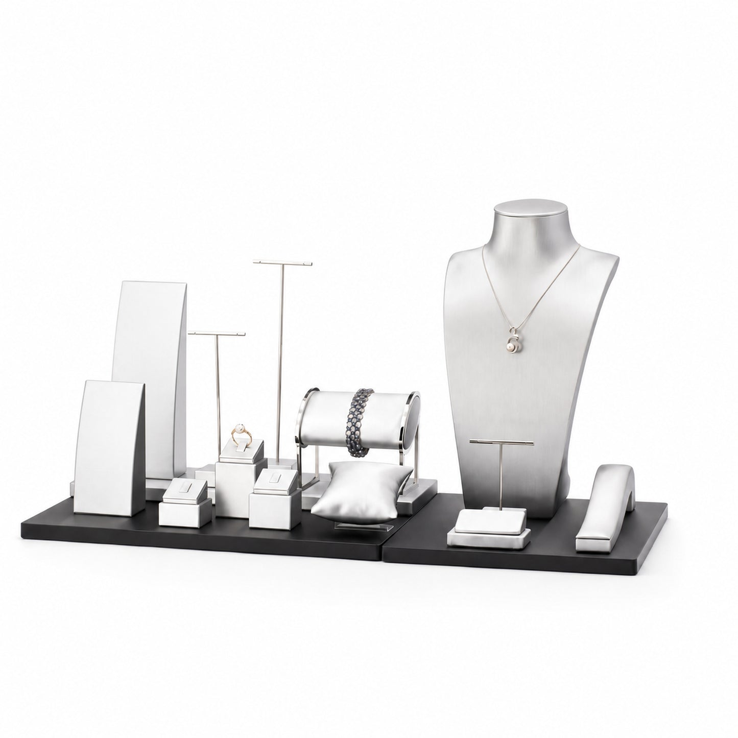 Custom Black and White Multi-Level Jewelry Display Set shown without the backboard in a black and white arrangement with jewelry visible on the display pieces