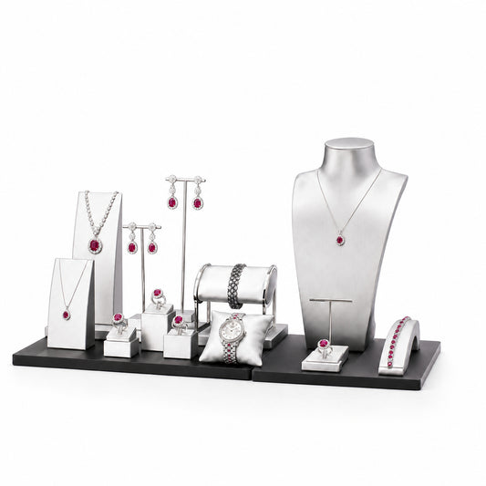 Custom Black and White Multi-Level Jewelry Display Set without the backboard, styled with necklaces, earrings, rings and bracelets across the coordinated display pieces