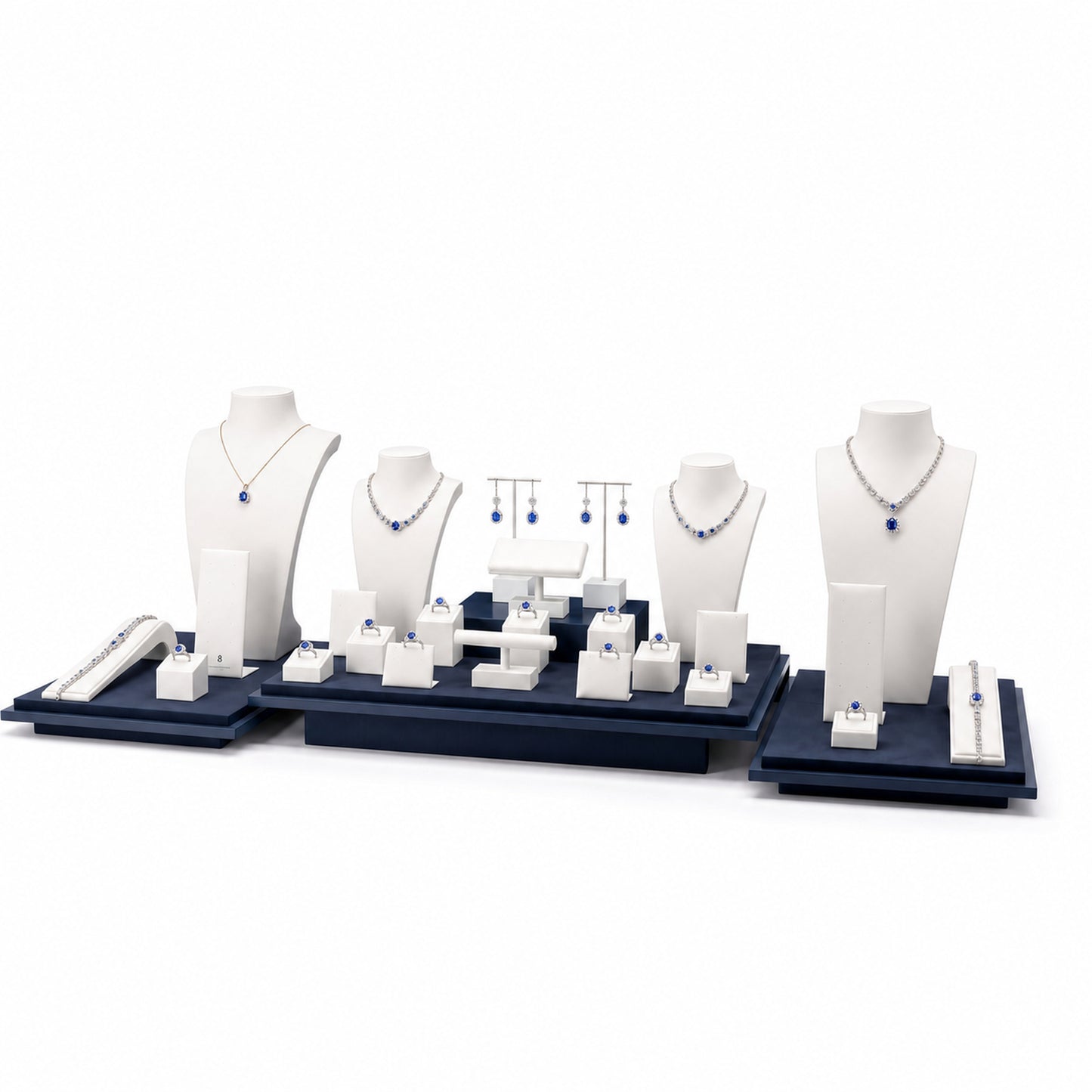 Custom Blue and White Three-Zone Wholesale Jewelry Display without the backboard, styled with necklaces, earrings, rings and bracelets across the coordinated display pieces