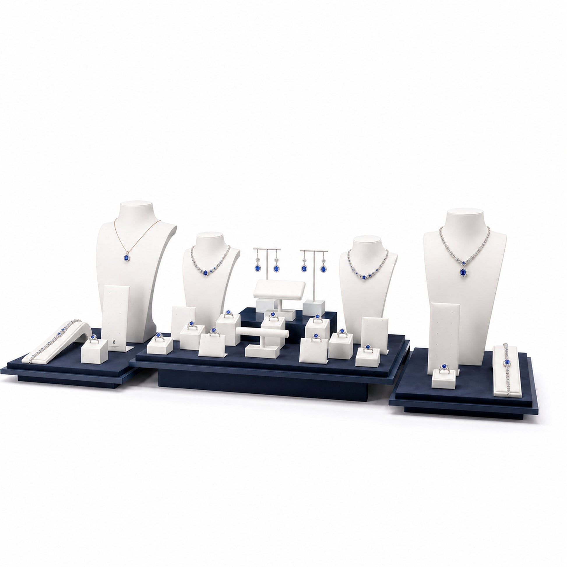 Custom Blue and White Three-Zone Wholesale Jewelry Display without the backboard, styled with necklaces, earrings, rings and bracelets across the coordinated display pieces