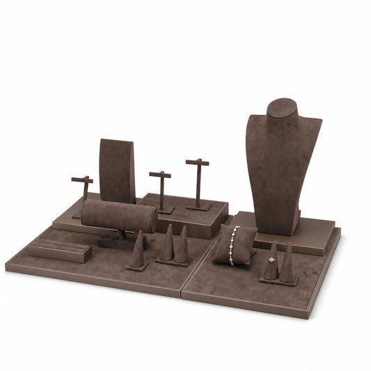 Custom Brown Quilted-Backdrop Jewelry Showcase Set shown without the backboard in a tonal brown arrangement with jewelry visible on the display pieces