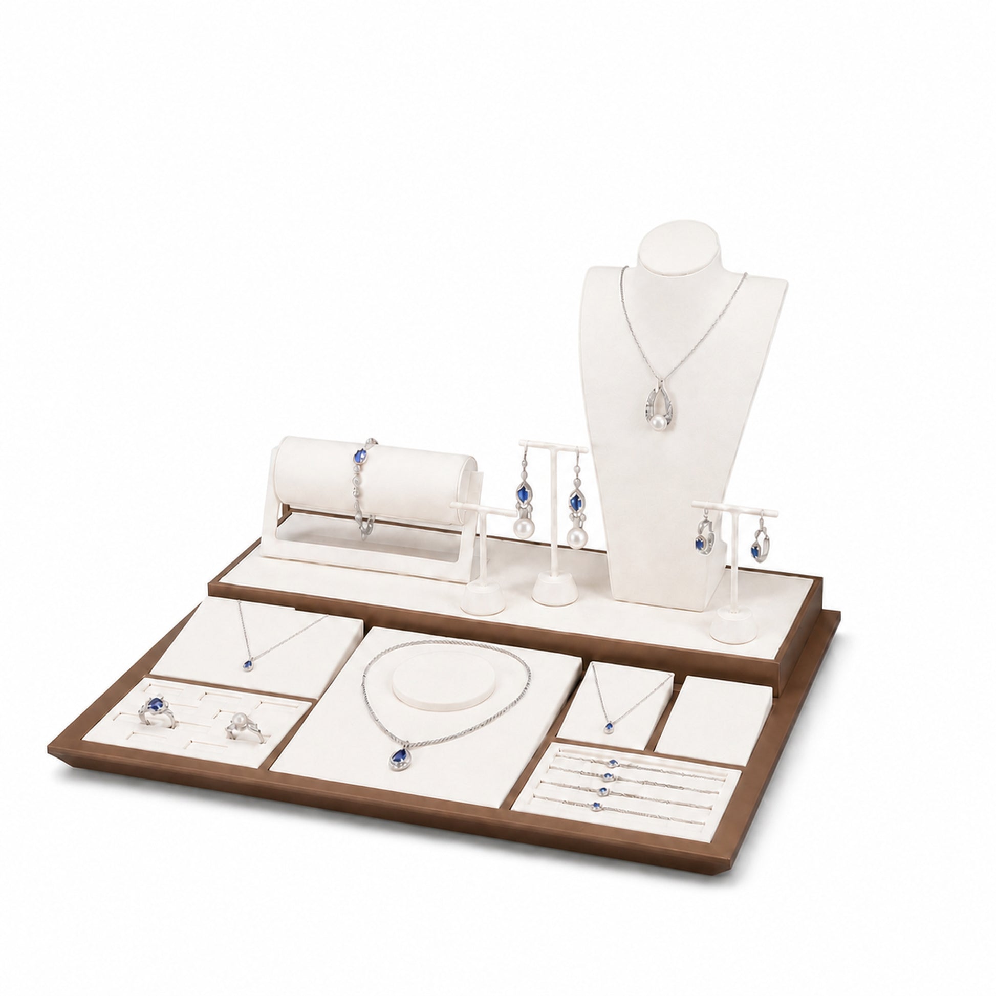 Custom Cream and Brown Jewelry Display Counter Set without the backboard, styled with necklaces, earrings, rings and bracelets across the coordinated display pieces
