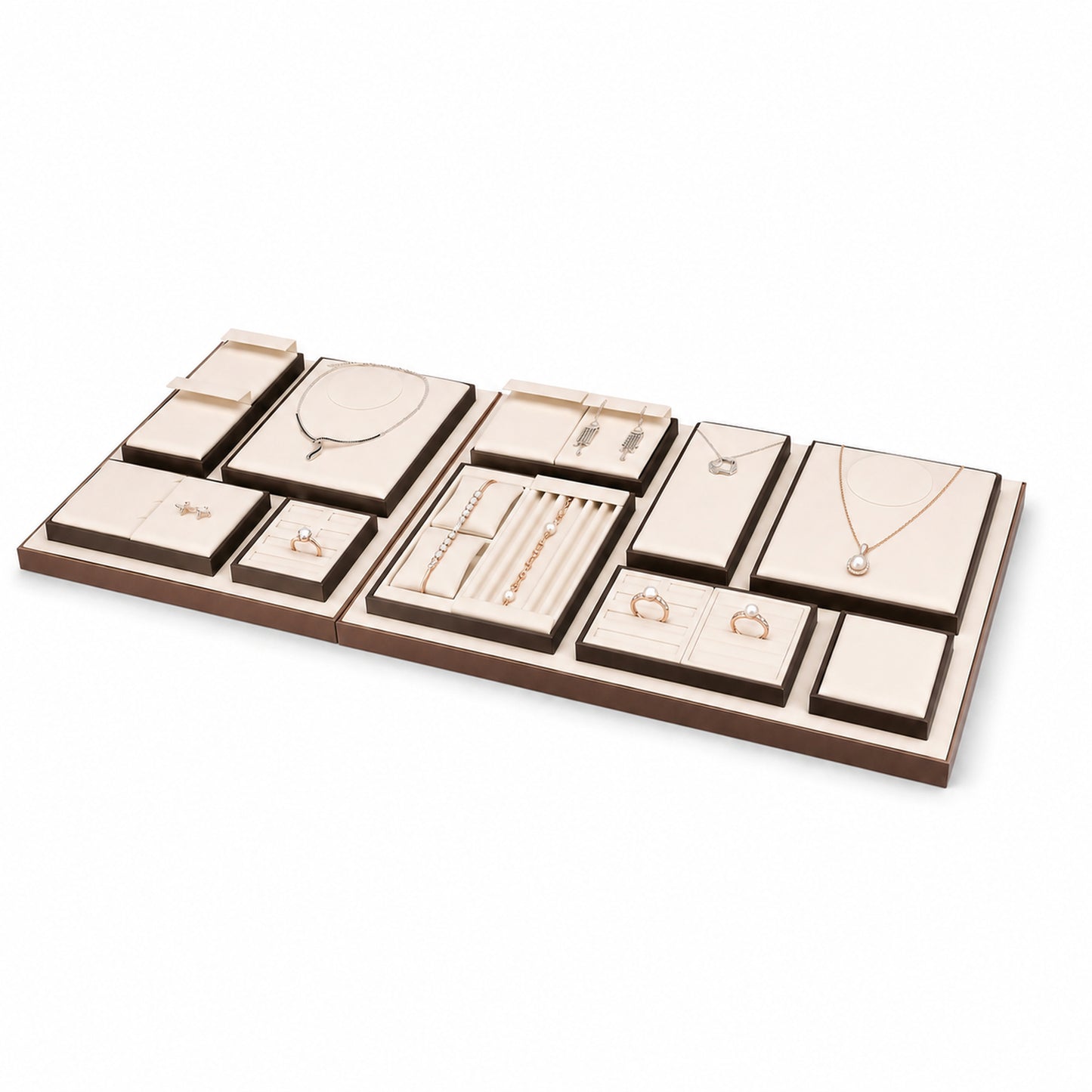 Custom Cream Compartment Jewelry Display Tray Collection without the backboard, styled with necklaces, earrings, rings and bracelets across the coordinated display pieces