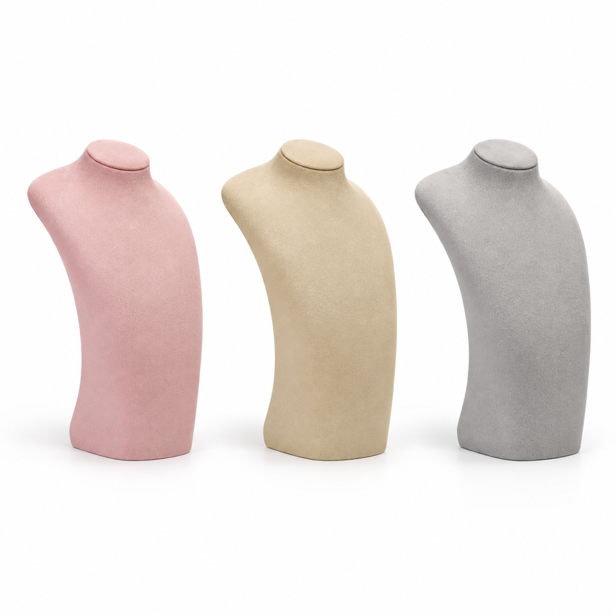 Curved velvet necklace display busts in pink, khaki and gray on a pure white background