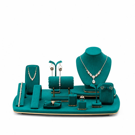 Custom Emerald Arch Showcase Jewelry Display Set without the backboard, styled with necklaces, earrings, rings and bracelets across the coordinated display pieces