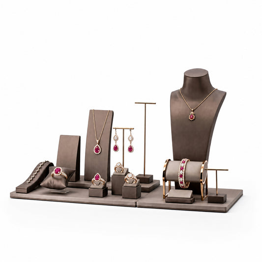 Custom Lattice Backdrop Jewelry Display Set without the backboard, styled with necklaces, earrings, rings and bracelets across the coordinated display pieces
