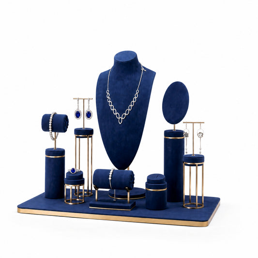 Custom Navy Rounded-Panel Jewelry Display Showcase without the backboard, styled with necklaces, earrings, rings and bracelets across the coordinated display pieces