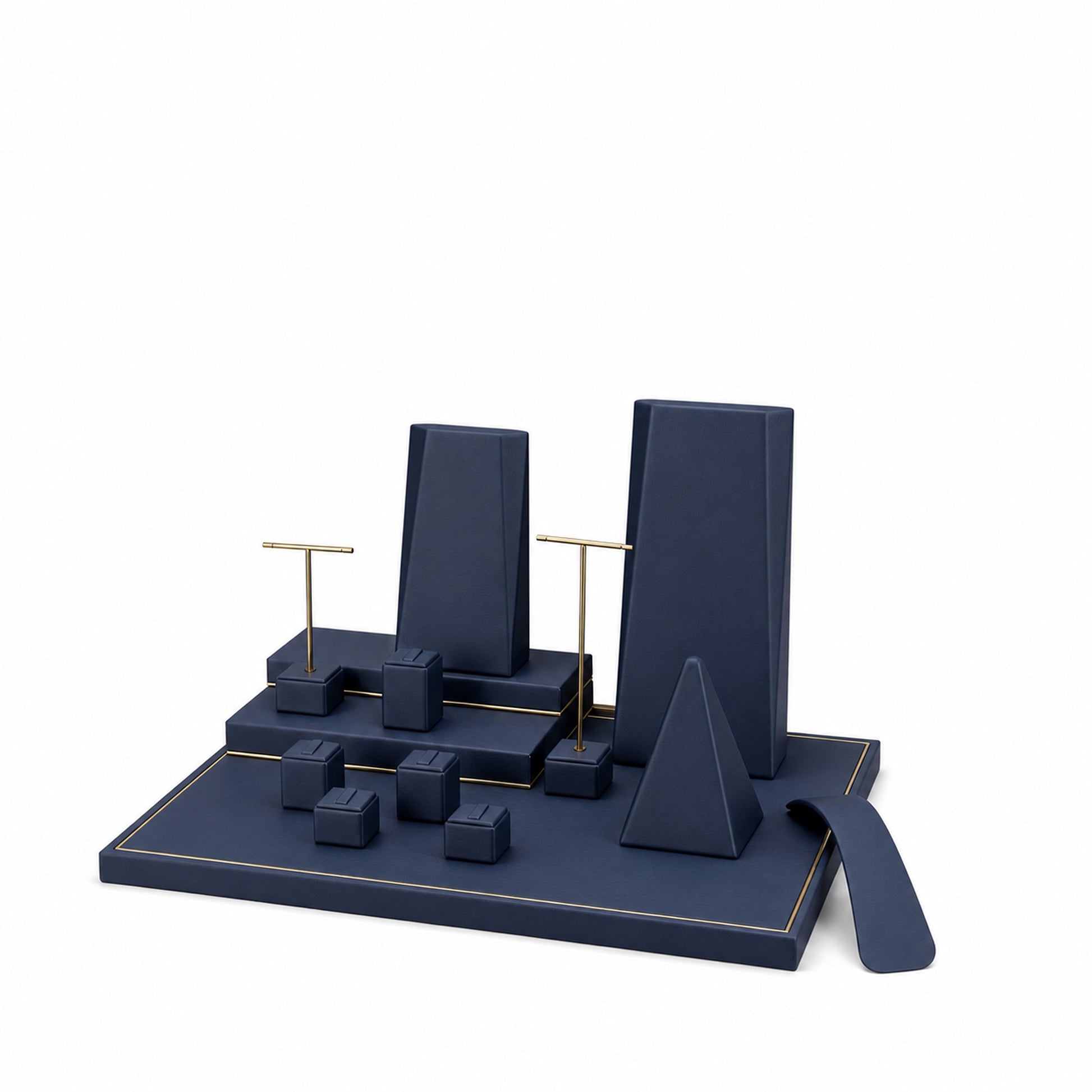 Custom Navy Tiered Jewelry Showcase Display Set shown without the backboard in a navy and gold arrangement with the display pieces presented for configuration review