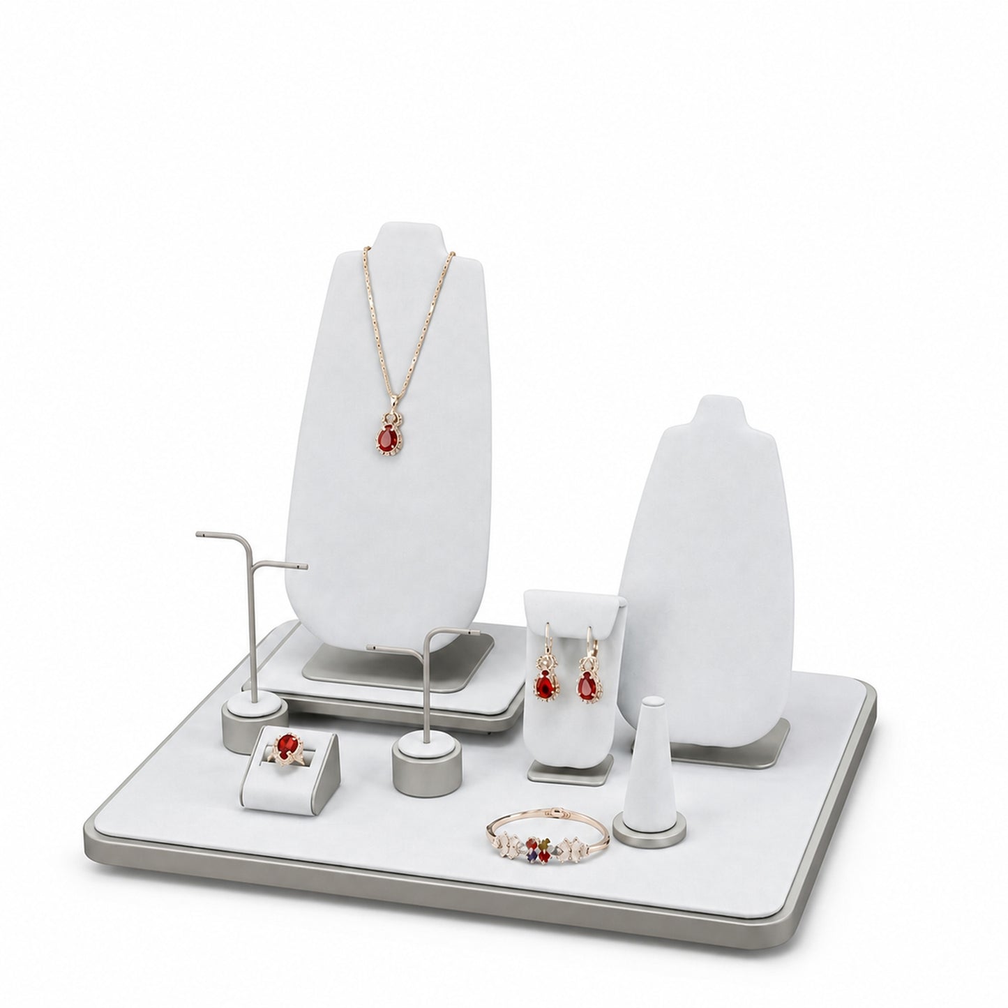 Custom White Geometric Countertop Jewelry Display shown without the backboard in a white and gray arrangement with jewelry visible on the display pieces