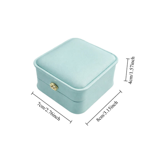 Tiffany Blue pendant presentation case featuring curved corners, a hinged lid, and a cushioned jewelry platform.