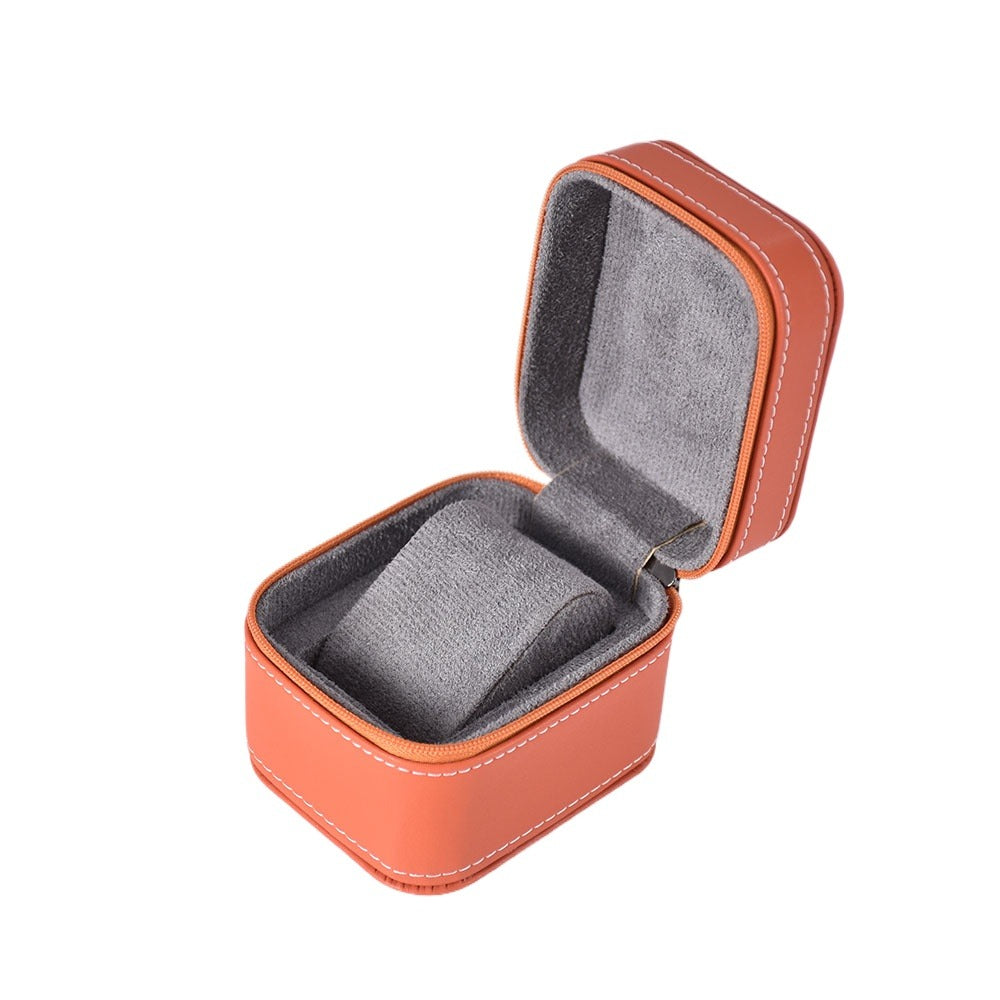 Jeweller Buy portable watch holder shown open with a zip closure and fitted gray pillow.