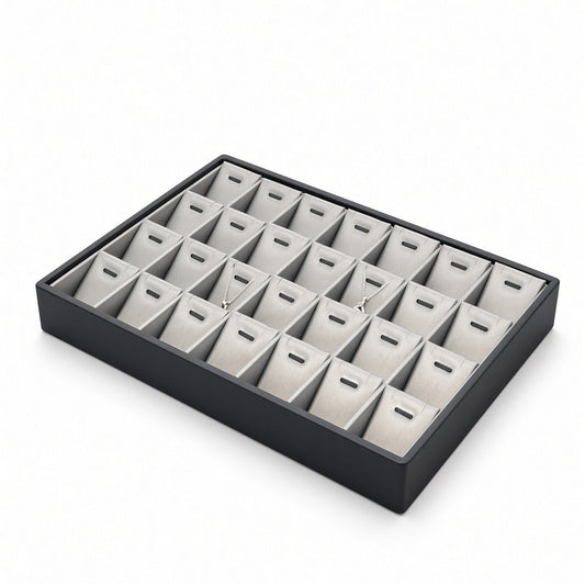 Silver 28-slot pendant necklace display tray with jewelry angled view