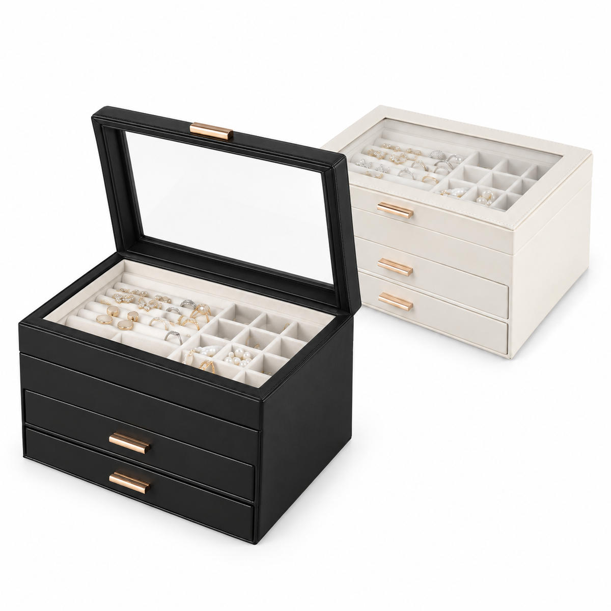 White and black three-layer jewelry boxes with drawers, showing one clear lid open toward the lower left