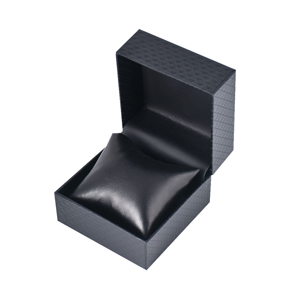 Open black paper watch and bracelet gift box with a matching cushioned pillow on a white background.