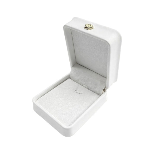 Open white rounded-corner pendant box with a padded interior, jewelry attachment loops, and gold-tone ornament.